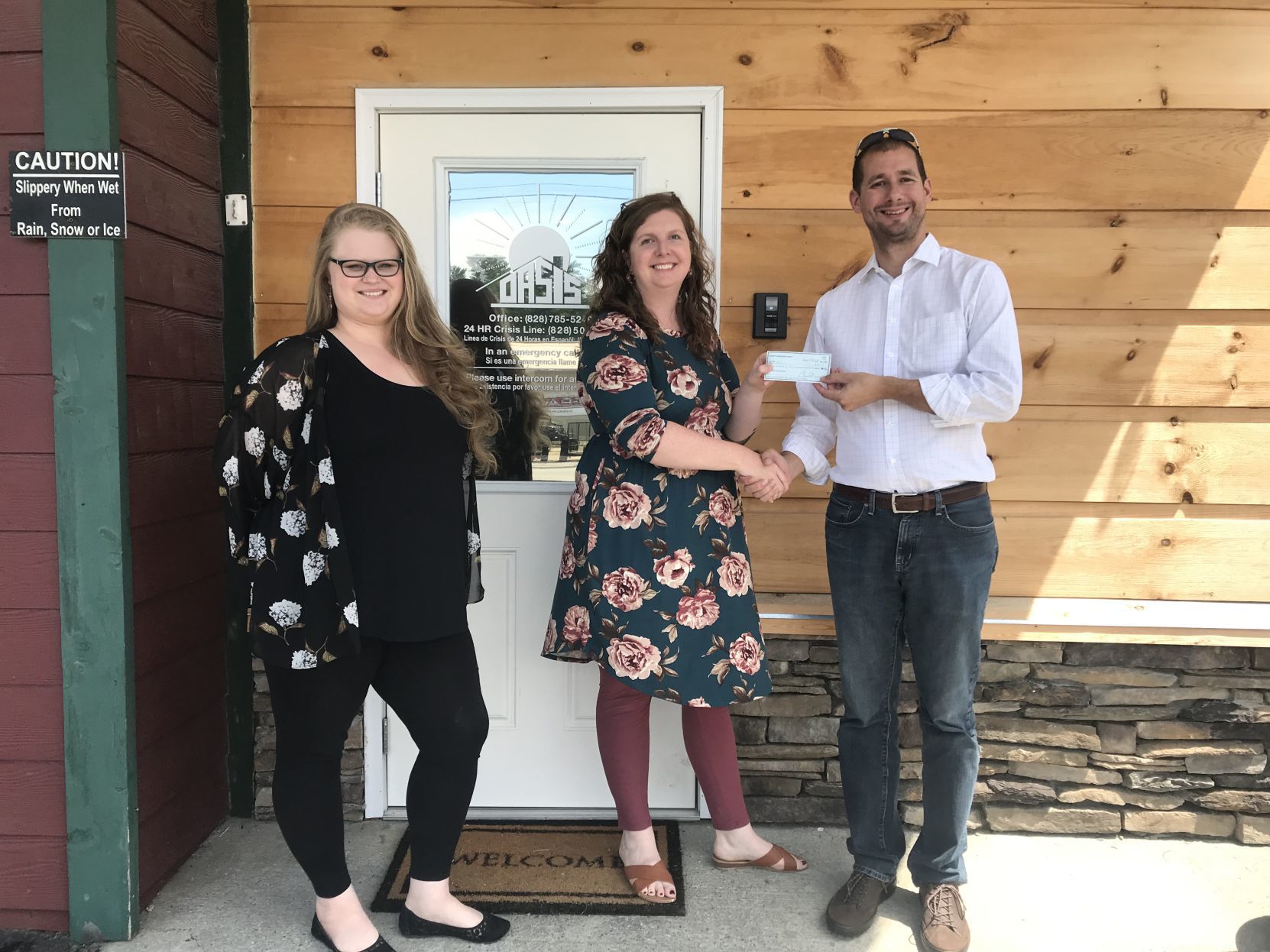 Rotary Club presents check to OASIS